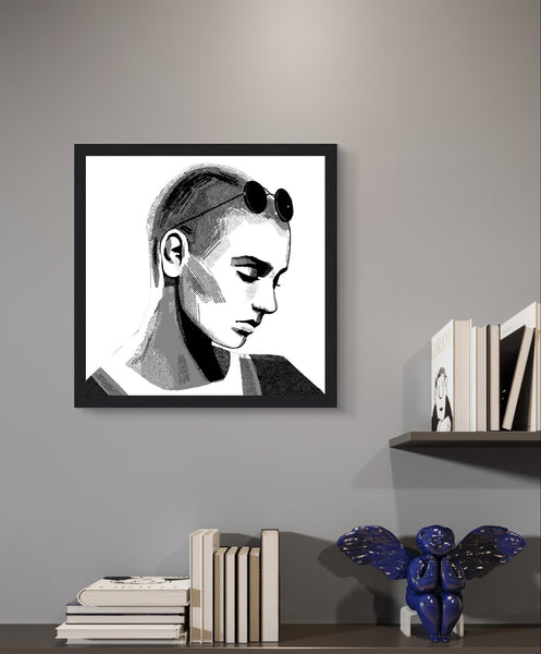 Framed wall art print of Sinéad O'Connor features a high-quality portrait capturing the iconic singer's striking presence, wearing sunglasses. This vintage music framed wall art showcases the Irish pop star, perfect for retro posters and prints. Ideal for fans of musician prints and Irish princess decor.