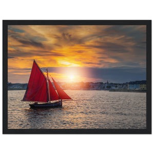 Detailed framed print of a Galway Hooker, a traditional Irish fishing boat, against a scenic coastal backdrop. Rich colors and intricate details evoke maritime nostalgia and charm.