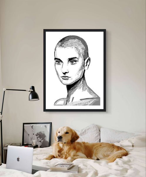 Framed wall art print of Sinéad O'Connor features a high-quality portrait capturing the iconic singer's striking presence. This vintage music framed wall art showcases the Irish pop star, perfect for retro posters and prints. Ideal for fans of musician prints and Irish princess decor.