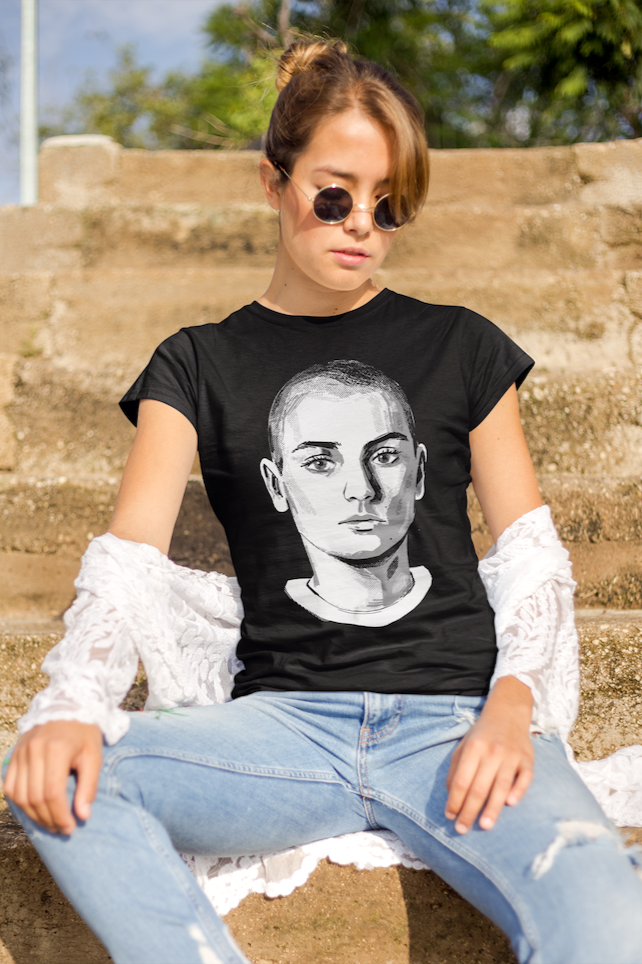 Sinead O'Connor Vintage-Inspired T-Shirt, Retro Music Tee celebrating the Irish singer and protest icon. Timeless artistry captured in this unisex tee, available in various sizes for fans.