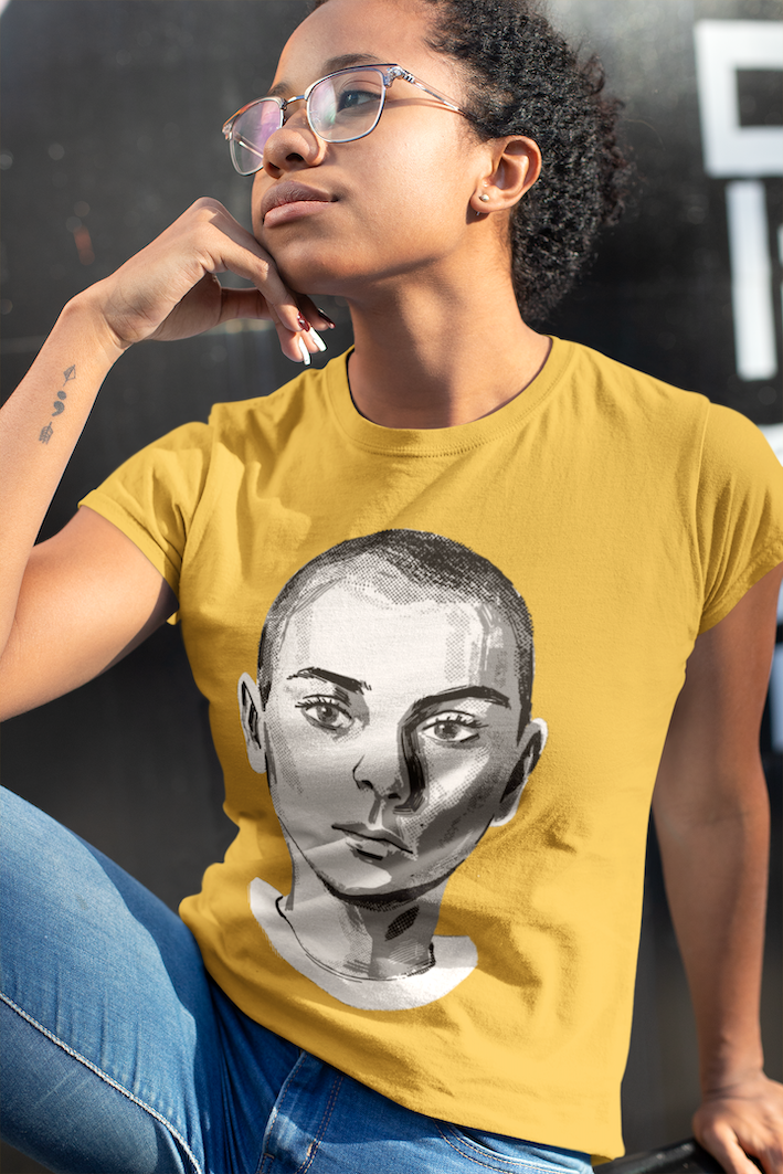 Sinead O'Connor Vintage-Inspired T-Shirt, Retro Music Tee celebrating the Irish singer and protest icon. Timeless artistry captured in this unisex tee, available in various sizes for fans.