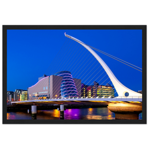 Enchanting Dublin skyline at night: Samuel Beckett Bridge & Convention Centre lights reflected on River Liffey. Framed art print captures city's magic.