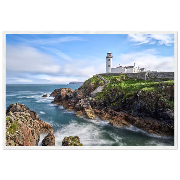 Capture the breathtaking beauty of Fanad Head Lighthouse in Co. Donegal, Ireland with our framed print. This captivating piece beautifully portrays the iconic landmark, offering a slice of Ireland&#39;s rugged coastal charm for your home decor.