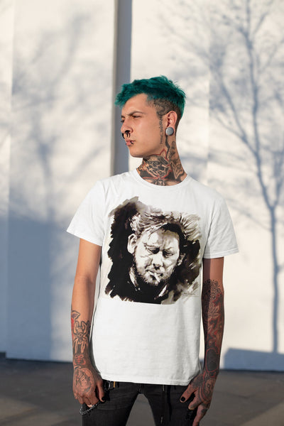 Shane MacGowan T-Shirt featuring a bold portrait of the Irish folk music legend, capturing his iconic presence with a vintage vibe and rock and roll flair.