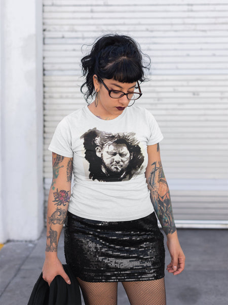 Shane MacGowan T-Shirt featuring a bold portrait of the Irish folk music legend, capturing his iconic presence with a vintage vibe and rock and roll flair.